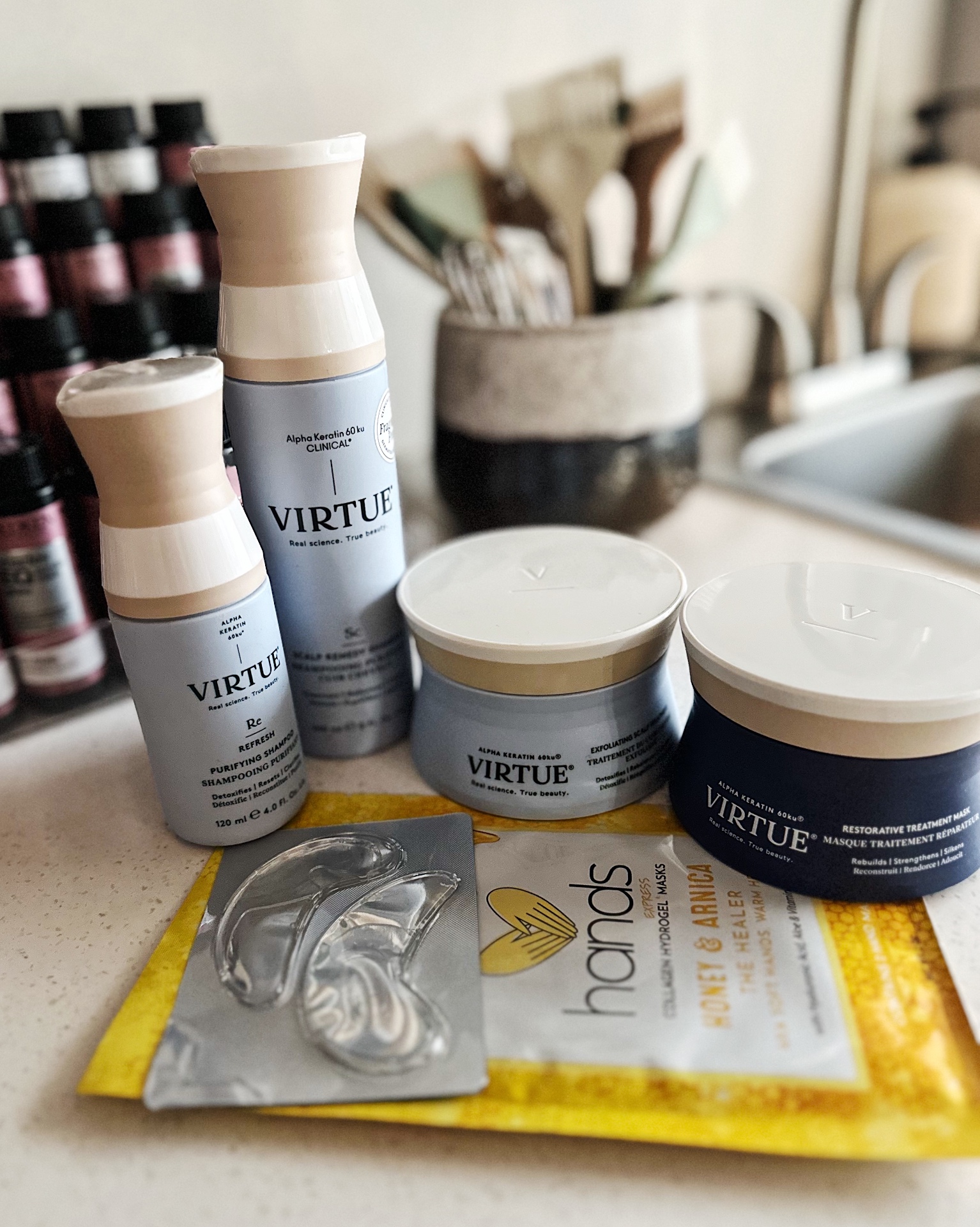 Virtue haircare products and pampering treatment add-ons on salon counter