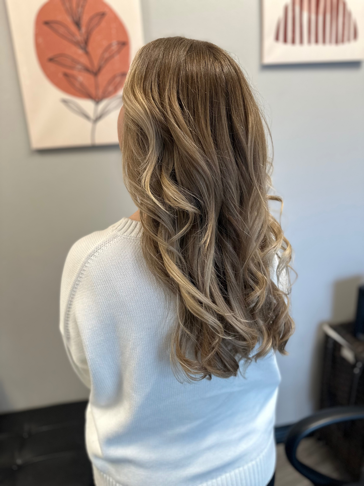 Back view of dimensional highlights and lowlights with seamless grow-out by Jenna Lauren